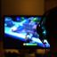 读者头像，一位玩家在深夜对着屏幕查看经脉面板